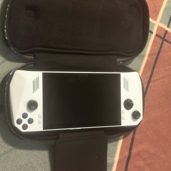 ASUS rog ally z1 extreme brand new condition all games are playing - Picture 9 of 11